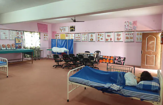 A training manikin on a bed in the Obstetrical & Gynaecological Nursing Laboratory