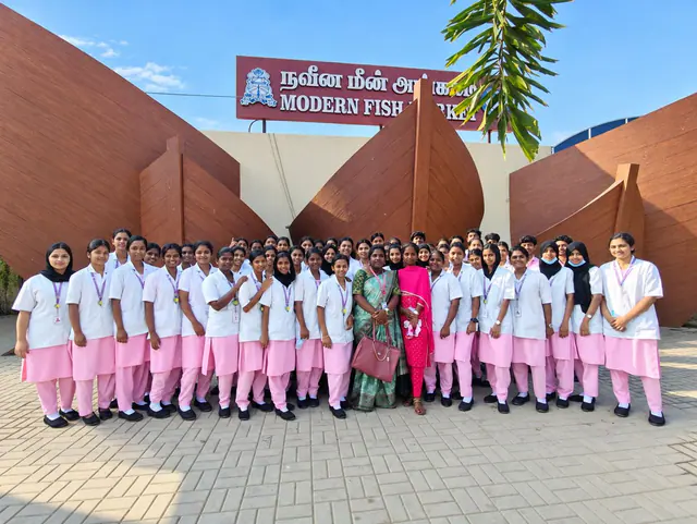 Students and faculty at the entrance of the Modern Fish Market