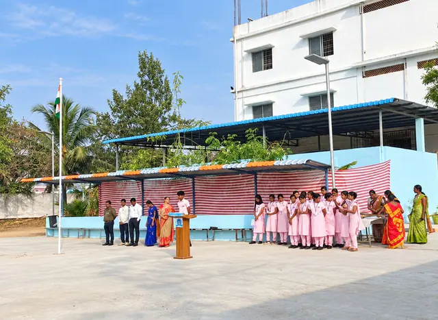 Flag hoisting ceremony with students and staff